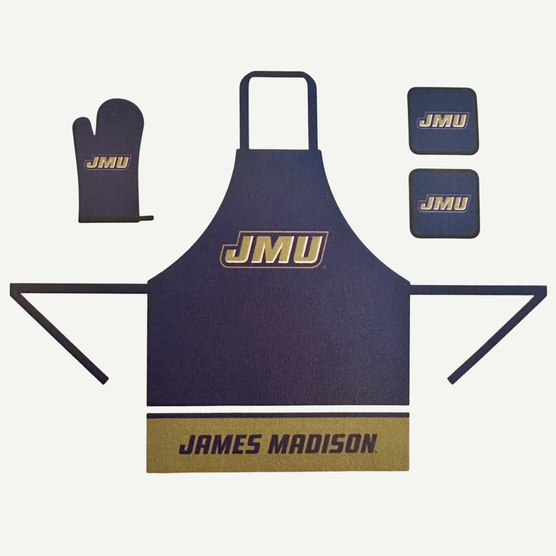 Navy apron with 'JMU' logo and 'James Madison' text, matching oven mitt and coasters on a white background.