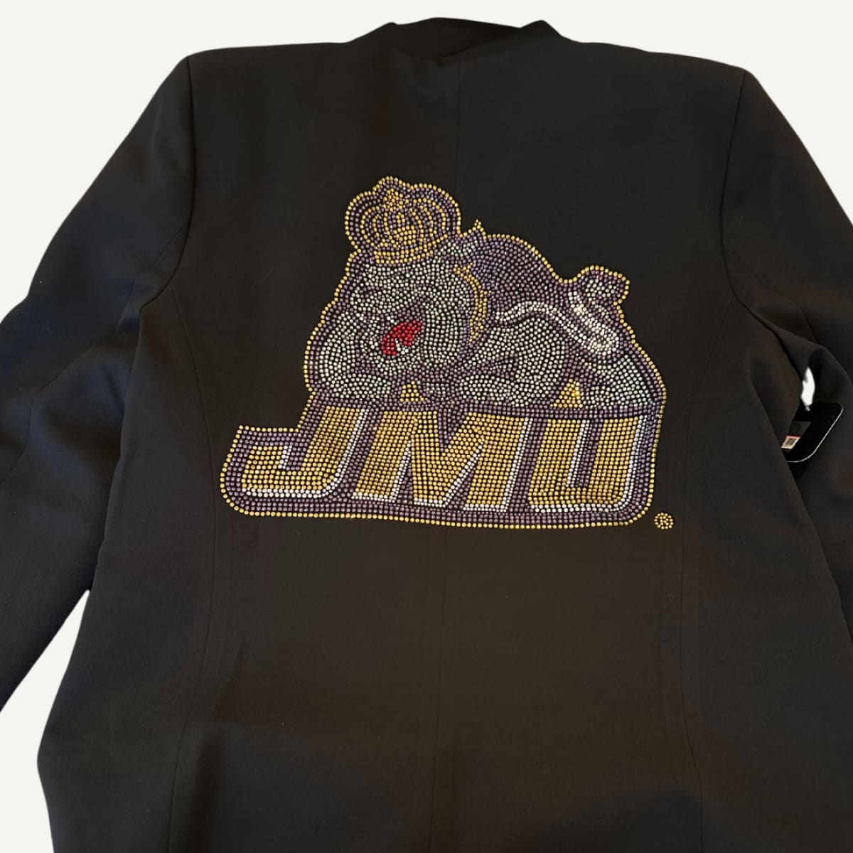 Black JMU Dukes Blazer featuring a crystal-embellished JMU logo on the back, satin lining, and stylish button details for a sophisticated game day look.BACK