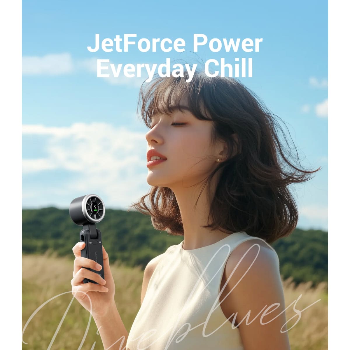 Woman holding a JetForce Power device with a scenic background