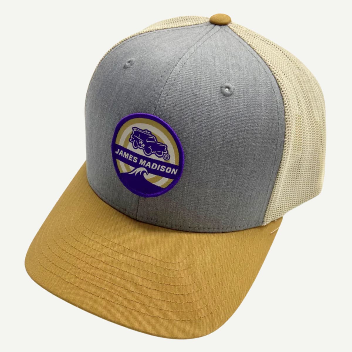 Wears Woody James Madison Mesh Back Trucker Hat with a crushable foam front, mid-high profile, woven patch, and snapback closure.