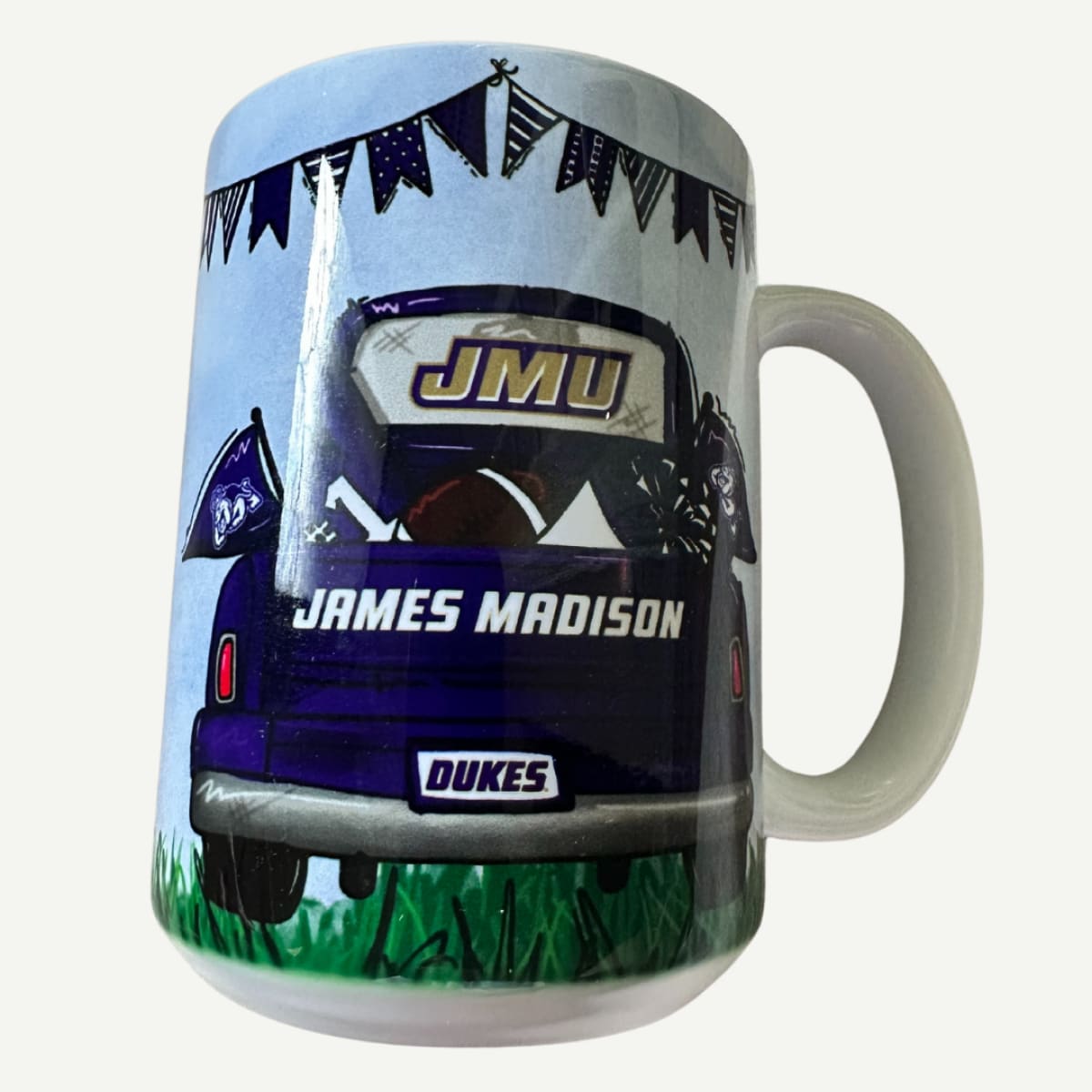 15 oz JMU Ceramic Mug with tailgate scene and James Madison Dukes graphics