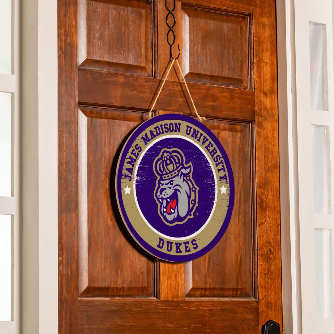 James Madison University Dukes logo on a wooden door