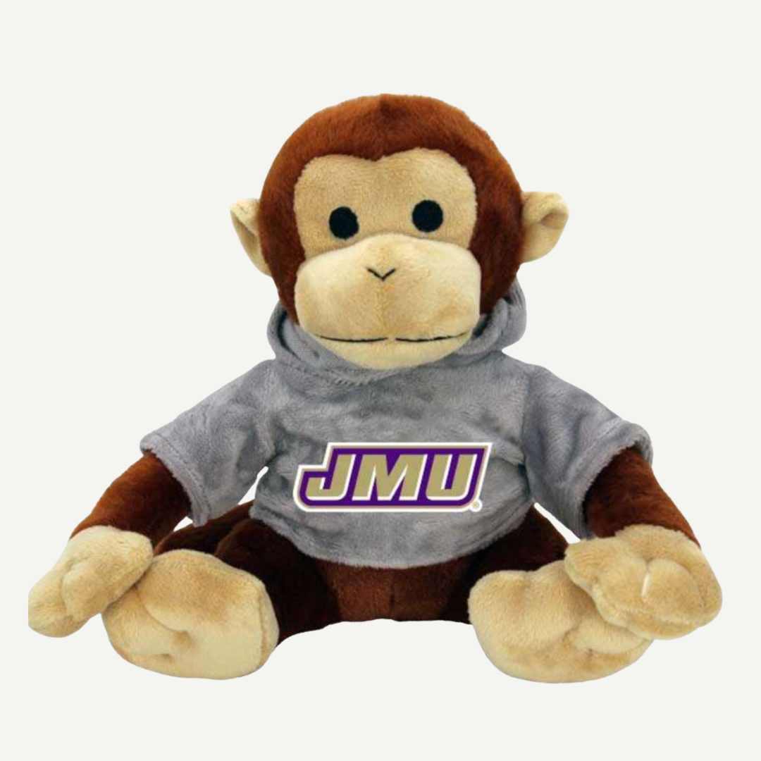 JMU stuffed monkey toy wearing a gray hoodie with the JMU logo on the front.