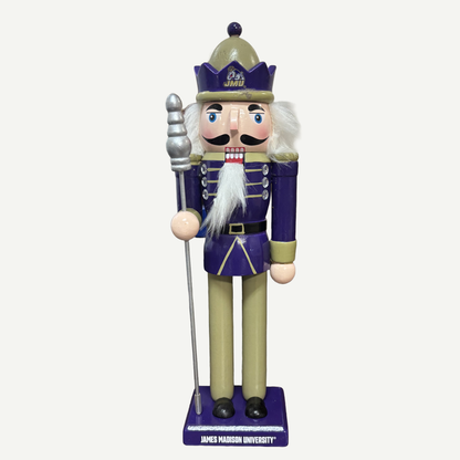 Nutcracker figurine with a purple uniform and white beard on a white background