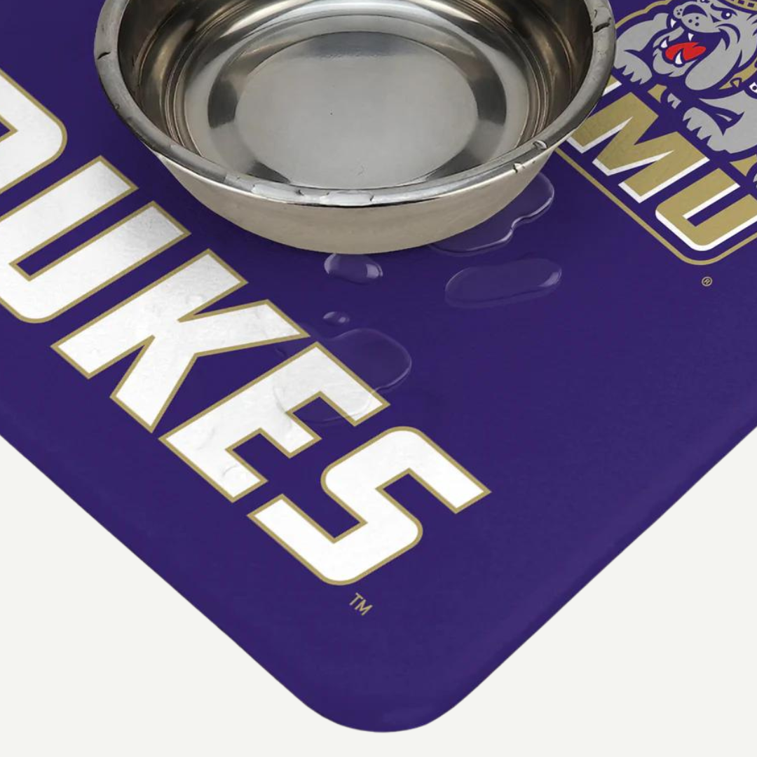 James Madison Dukes Food & Water Mat featuring JMU logo and purple background, perfect for pet owners and JMU fans.