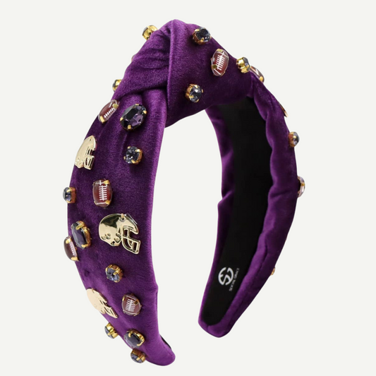 Purple headband with decorative elements on a white background