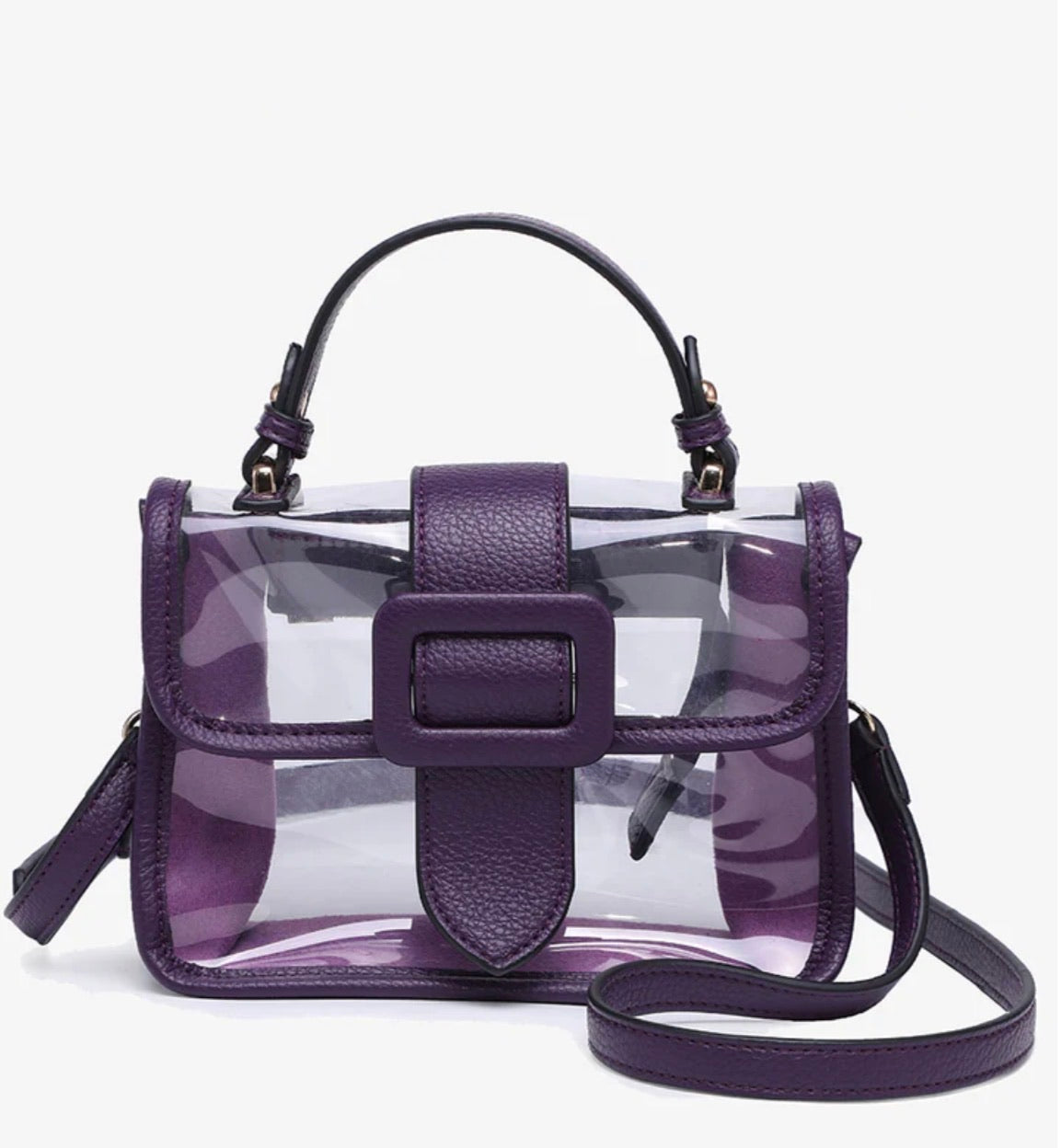 A purple and clear plastic handbag with a top handle, front flap, and shoulder strap, shown on a light gray background.