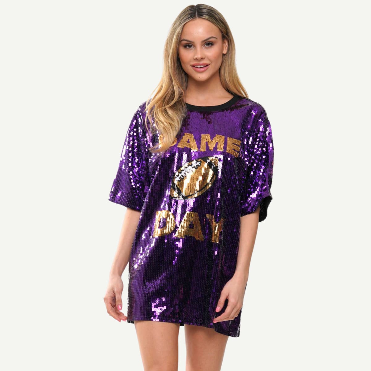 Gameday Sparkle Dress, bold purple hue, gold sequin 'Game Day' detailing" "James Madison University Gameday Sparkle Dress, sparkling football graphic, long sleeves with sequin stripes" "Close-up of Gameday Sparkle Dress, stylish and cozy, perfect for JMU fans