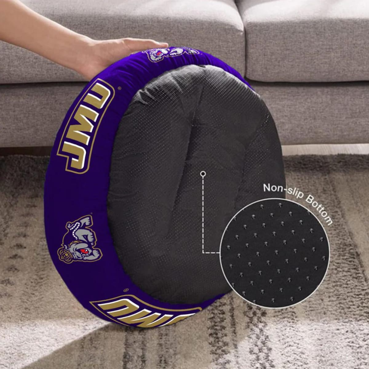 James Madison Dukes Plush Donut Dog Bed with JMU logos and non-slip bottom, providing comfort and style for pets.