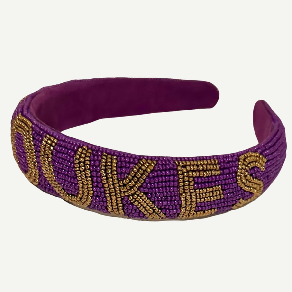 JMU Beaded Headband with purple and gold beadwork featuring the "Go Dukes" lettering.