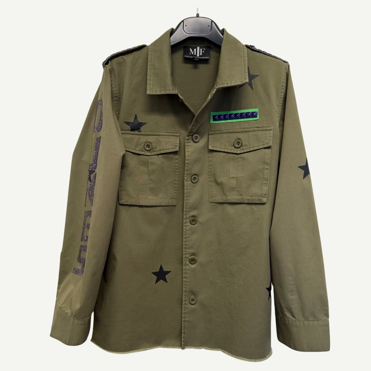 Front view of the JMU Bling Shacket, featuring purple studs, epaulet details, and a relaxed fit.