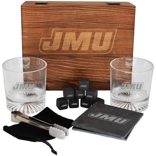 JMU branded glassware set with wooden box, glasses, ice cubes, tongs, and napkins on a white background.