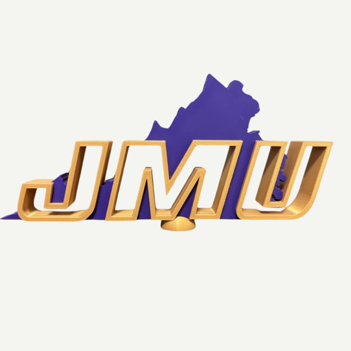 JMU Desk Decor featuring gold block letters 'JMU' with a purple state of Virginia background