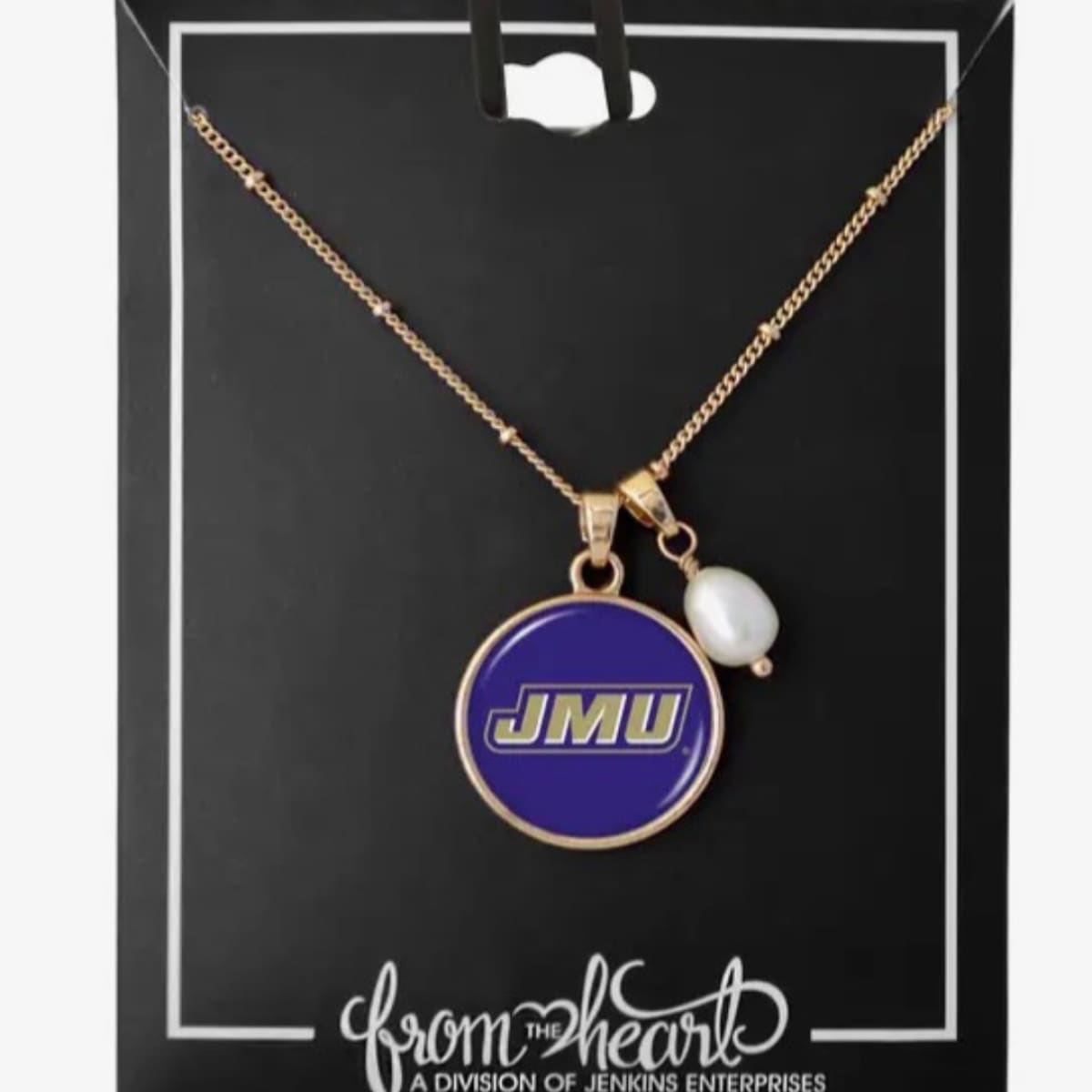 Necklace with blue pendant and pearl charm on a black card, featuring 'JMU' and 'from the heart' branding.