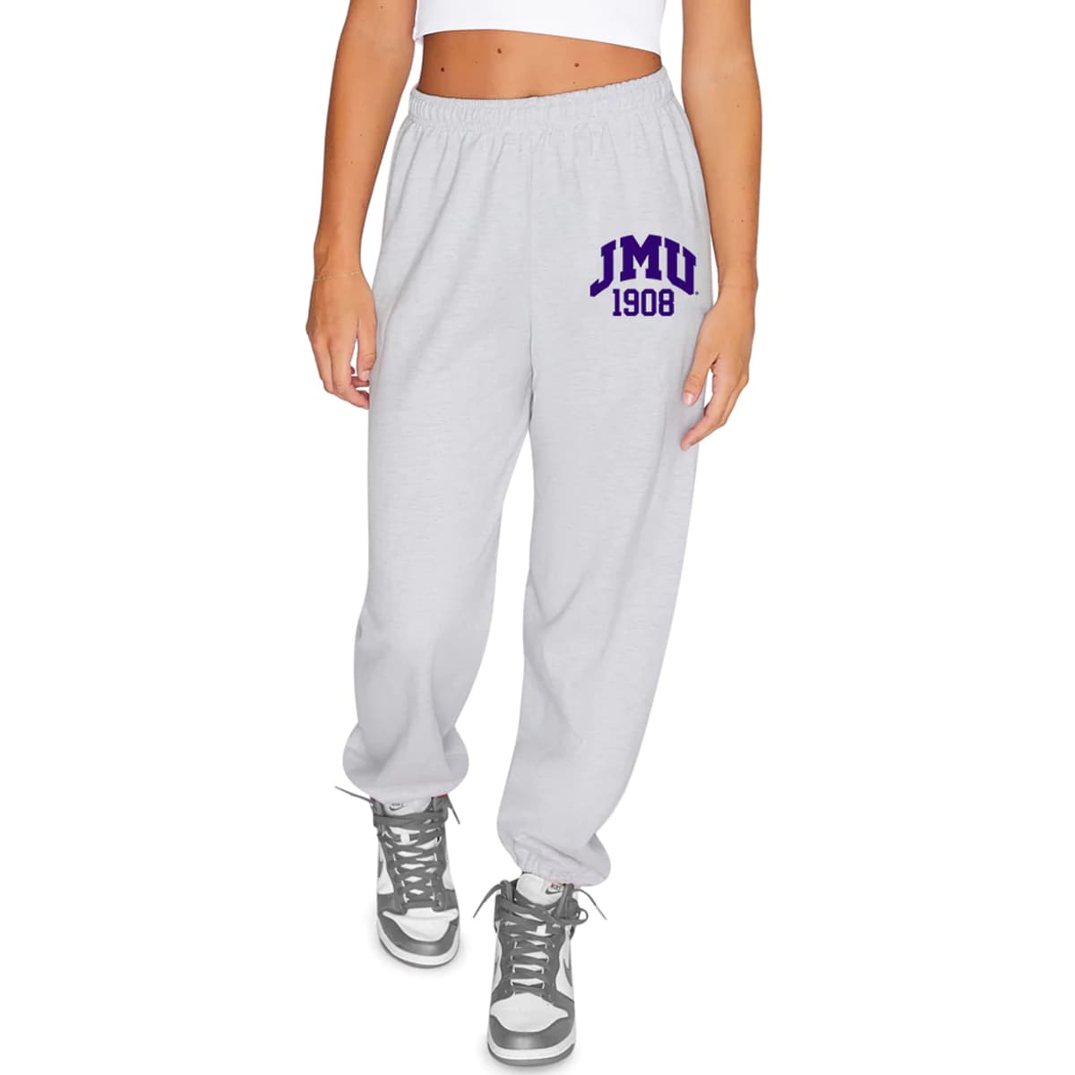 Experience comfort and school pride with our JMU Established Sweatpants! Made of high-quality materials, these sweatpants feature the iconic university logo for a stylish look. Perfect for lounging or hitting the gym, show off your Dukes spirit in these must-have sweatpants. Go Dukes!