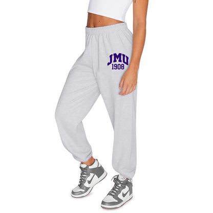 Experience comfort and school pride with our JMU Established Sweatpants! Made of high-quality materials, these sweatpants feature the iconic university logo for a stylish look. Perfect for lounging or hitting the gym, show off your Dukes spirit in these must-have sweatpants. Go Dukes!