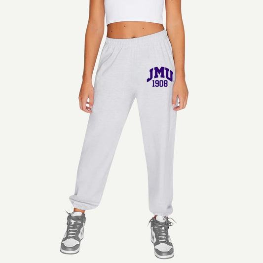 Experience comfort and school pride with our JMU Established Sweatpants! Made of high-quality materials, these sweatpants feature the iconic university logo for a stylish look. Perfect for lounging or hitting the gym, show off your Dukes spirit in these must-have sweatpants. Go Dukes!