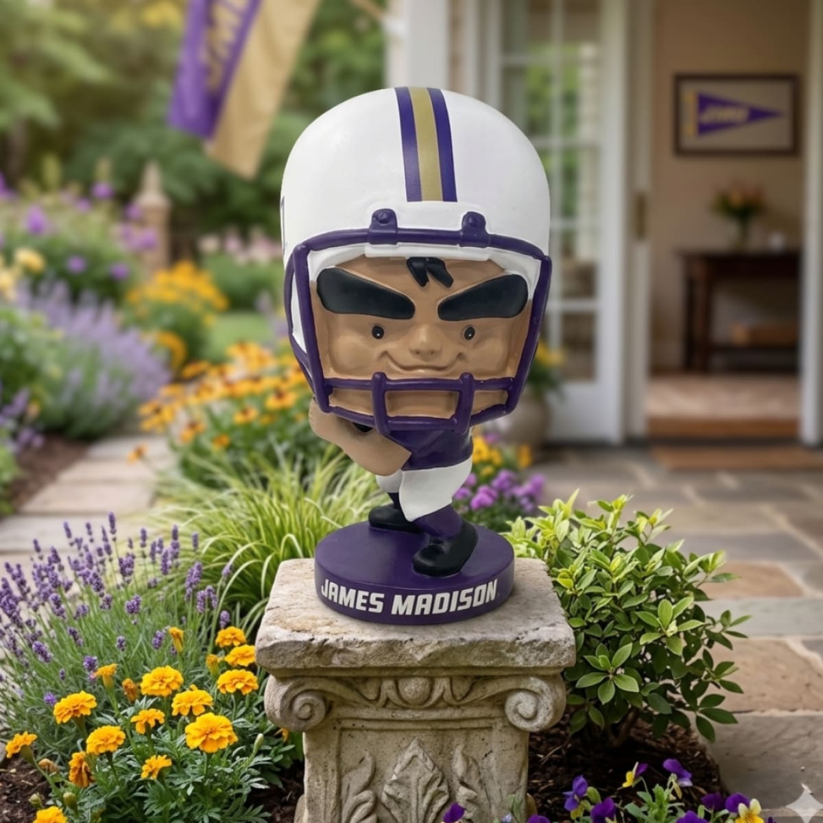 Bobblehead figure of a football player with helmet on a pedestal in a garden setting