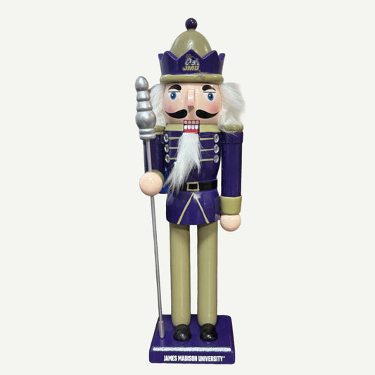 Nutcracker figurine with a purple uniform and white beard on a white background