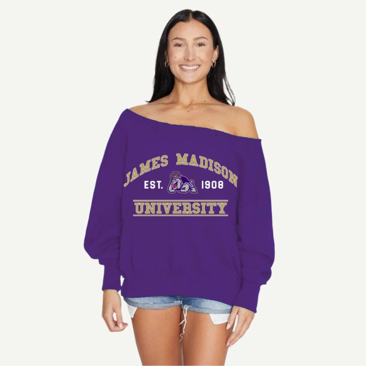 Woman wearing a purple 'James Madison University' sweatshirt on a white background