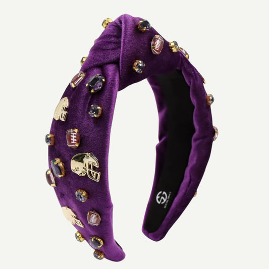 Purple headband with decorative elements on a white background