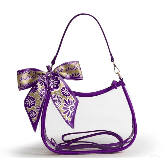 Clear handbag with a large purple bow on a white background